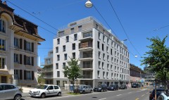 location appartements et bureaux immeuble locatif Chailly Lausanne Agence BCV Atelier Commun Architecte