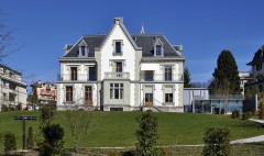 Villa Bellevue Extension contemporaine et restauration de la villa existante au siège de la Fédération Internationale de Natation (FINA) à Lausanne